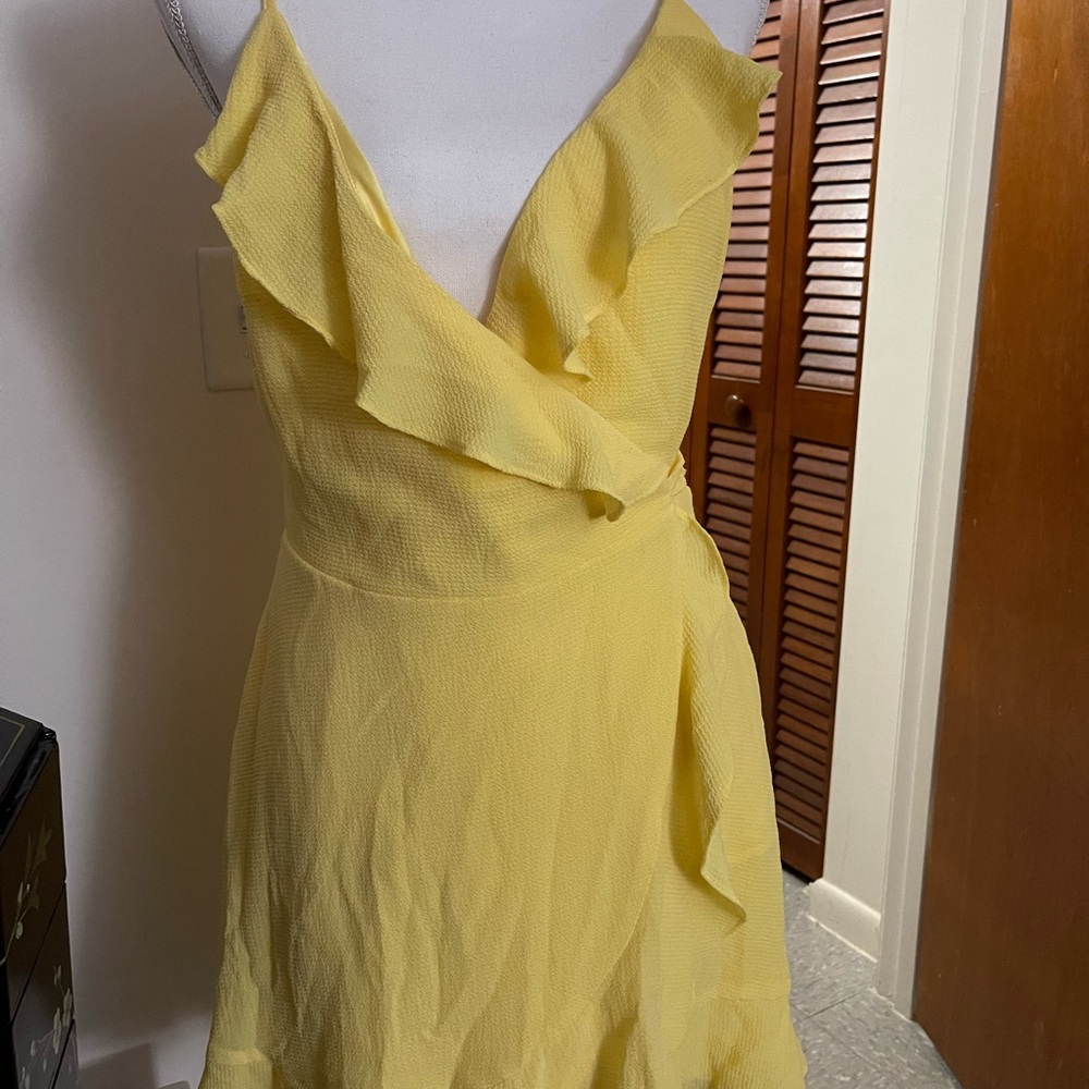 BEBE Yellow Wrap Around top/mini dress Size M